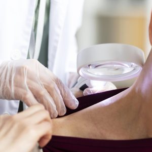doctor-doing-check-patient-with-skin-cancer