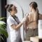 female-doctor-diagnosing-melanoma-body-female-patient