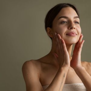 portrait-young-woman-practicing-facial-yoga-youth portrait-young-woman-practicing-facial-yoga-youth